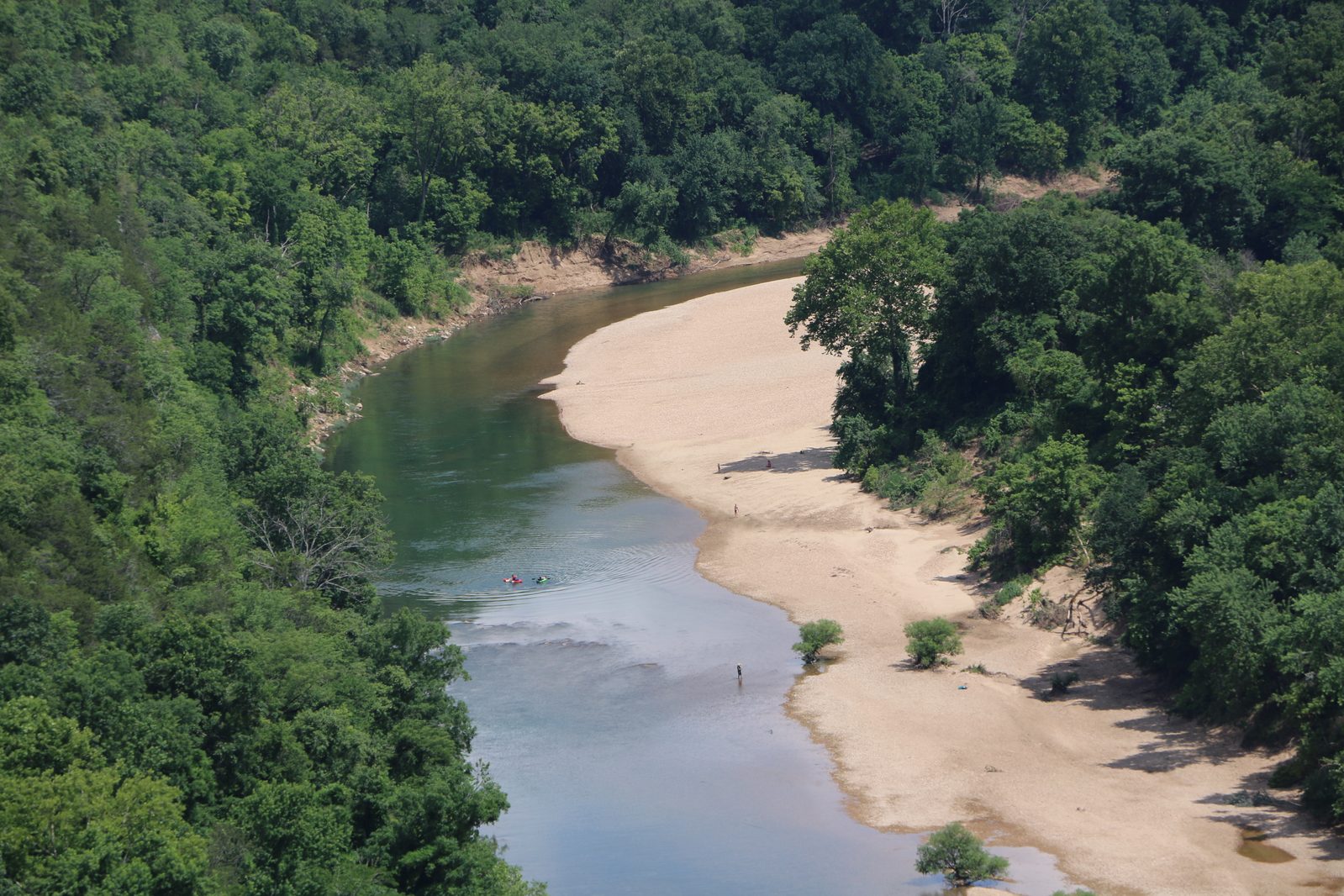 Boaters paddling together through the Lower Buffalo Wilderness in summer