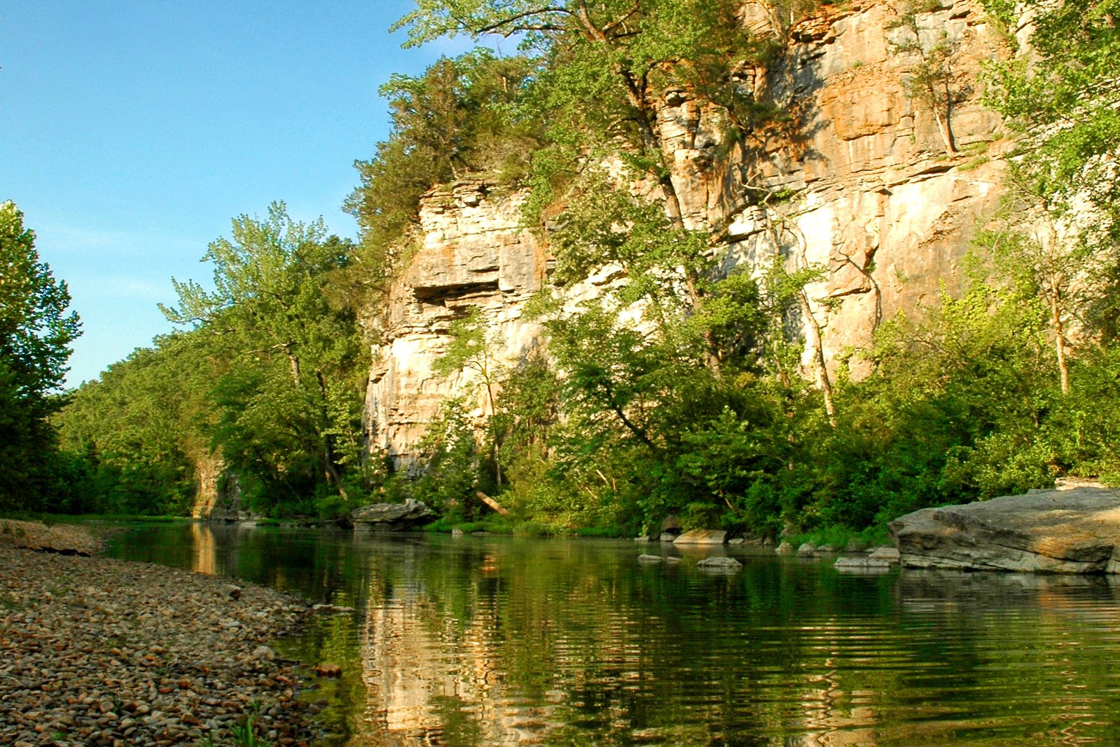 A bluff rising over the Buffalo River in the Middle District